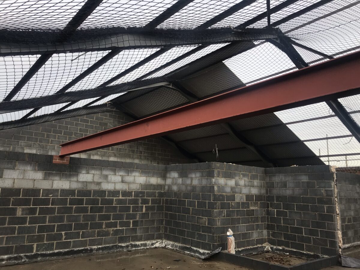 Barn conversion under construction with exposed steel frame