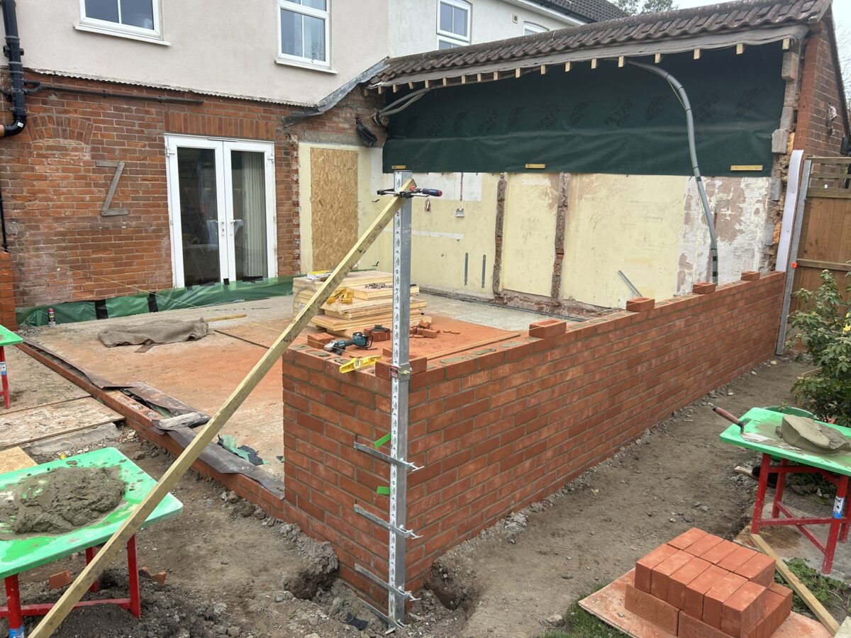 Brickwork rising around the South Walsham rear extension
