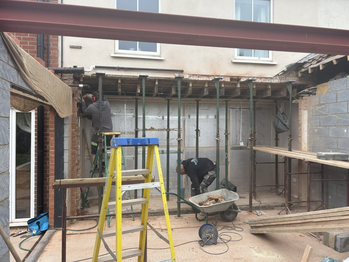 Temporary supports protecting the house during rear wall removal