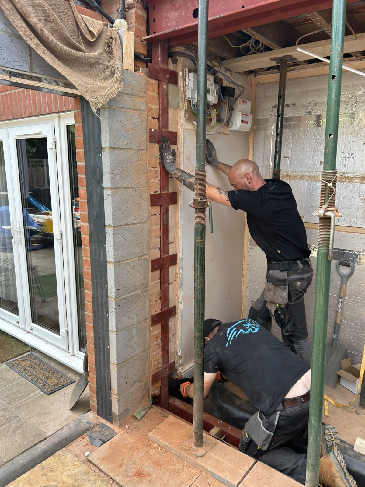 Vertical steel column being installed at the South Walsham extension