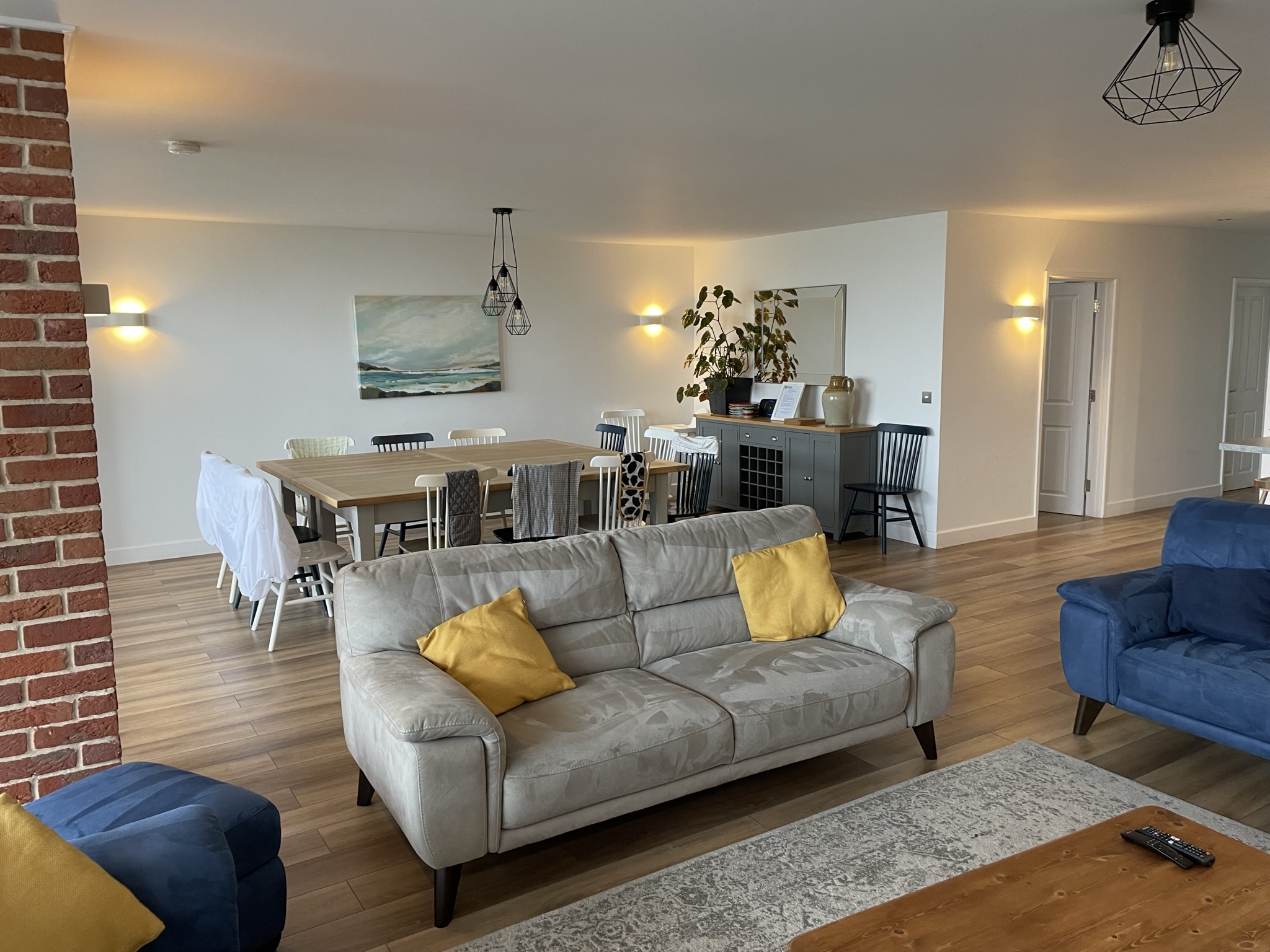 Barn conversions Norfolk finished living and dining room with exposed brickwork